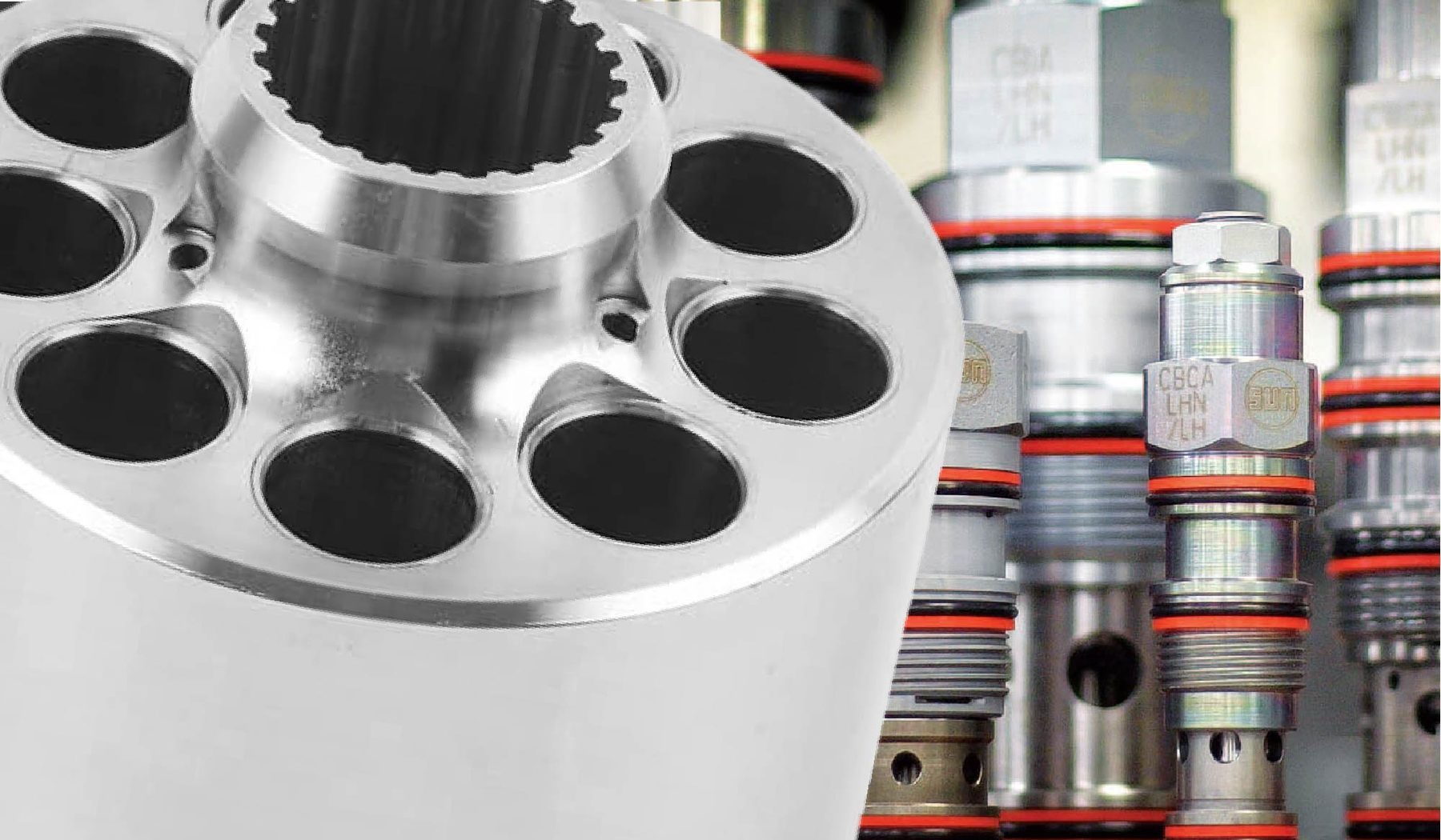 Axial piston pump cylinder barrel alongside Sun screw-in cartridge valves